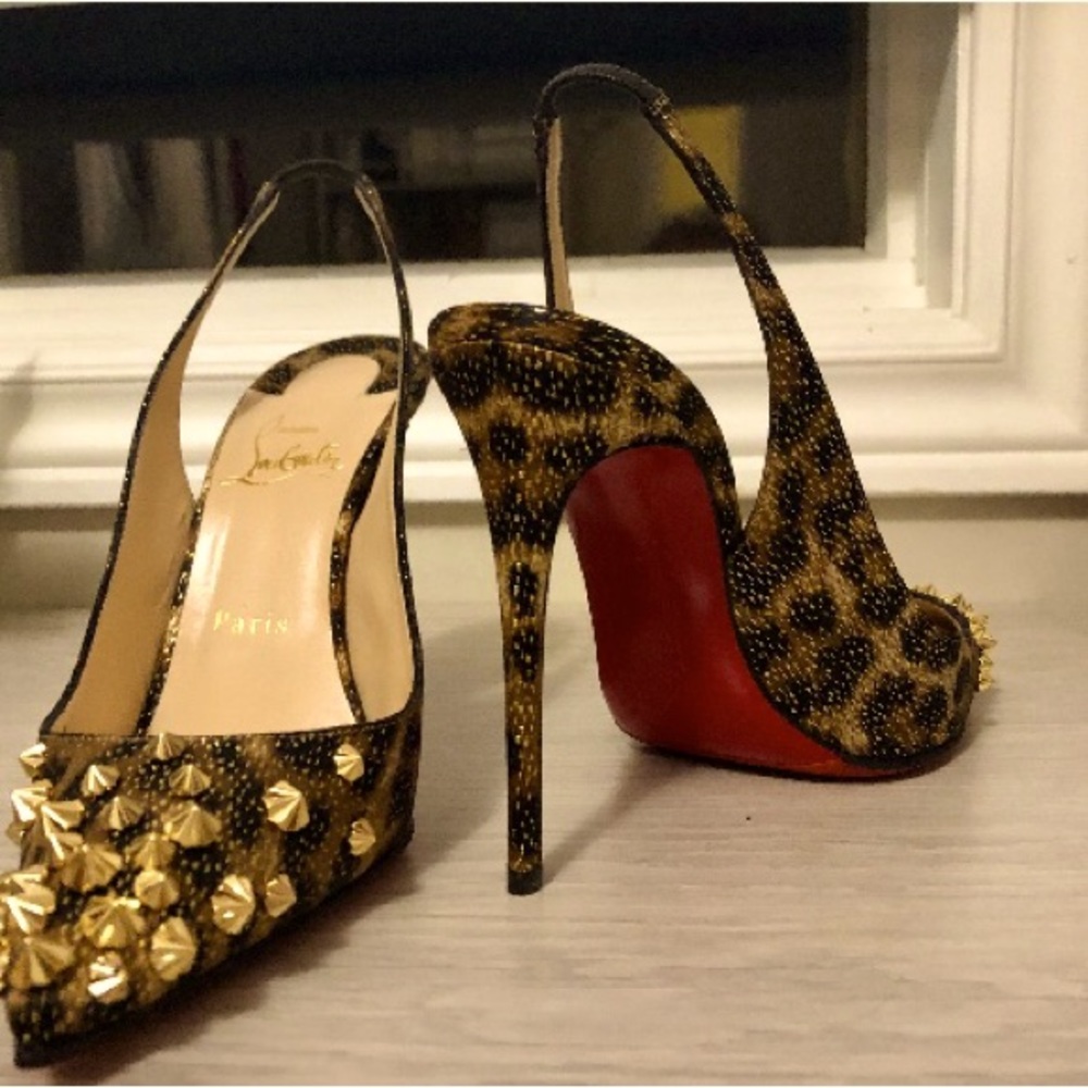 Christian Louboutin sling back heels. Size 37. Like new. Shoe bag added.